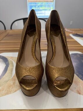 B by Brian Atwood Gold Platform Pumps.